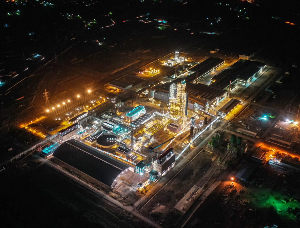 aerial view exterior of plant light up at night