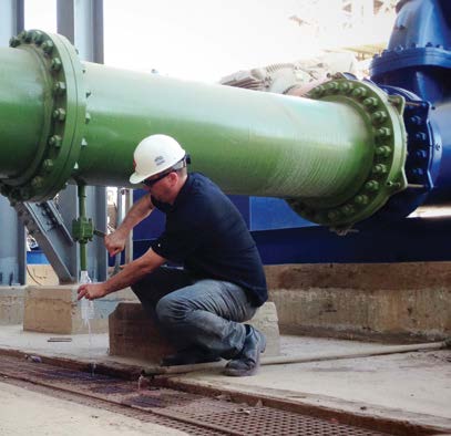 Midrex Workplace Safety - employee working on pipe