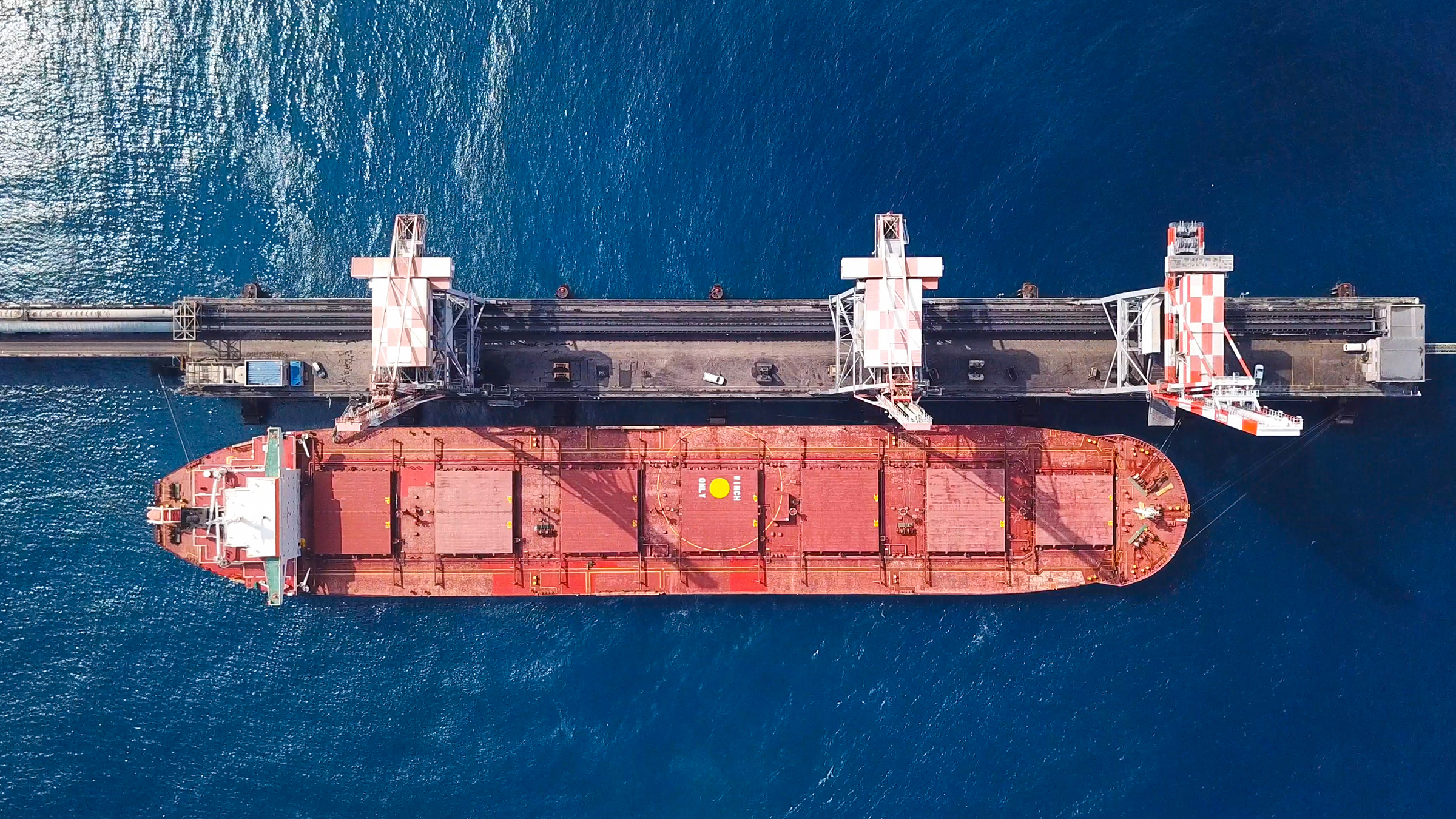 Bulkcarrierdockedinamediterraneanport Topdown